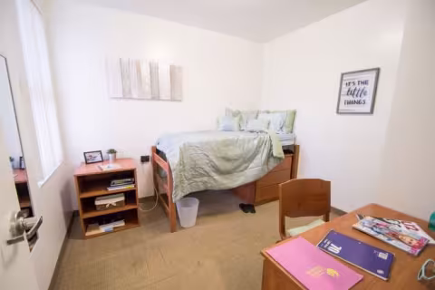 Decorated bedroom in a Nike 4x2 Apartment