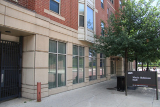 Outside view of Marie Robinson hall with sign